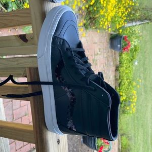 Vans high top black faux leather sneaker